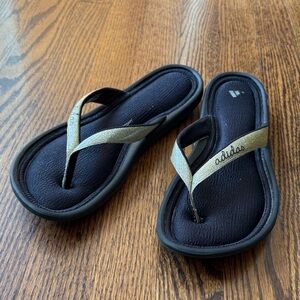 Adidas Women’s 9 Black Flip Flops with Metallic Gold Straps
